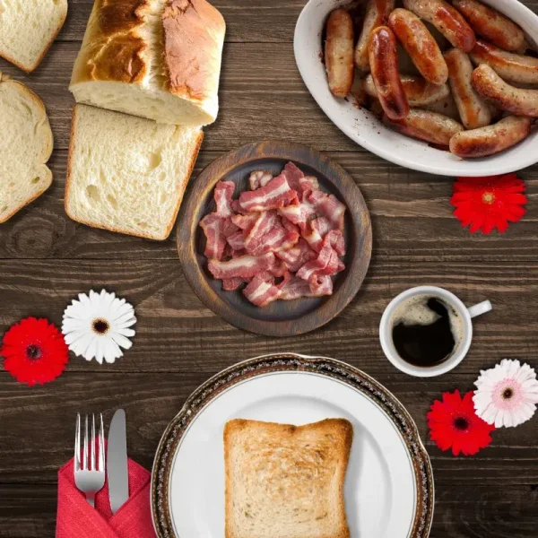A traditional breakfast featuring grilled pork sausages